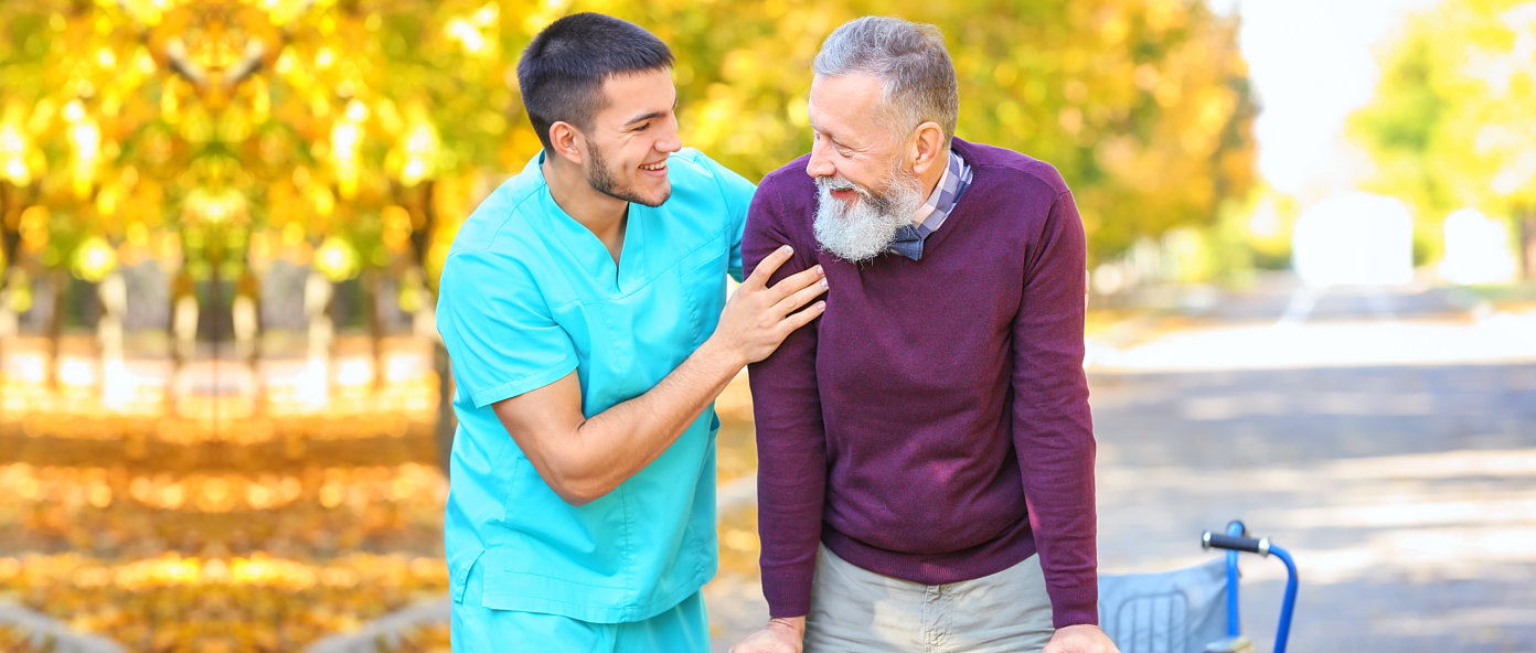 outdoor portrait of male nurse and his patient